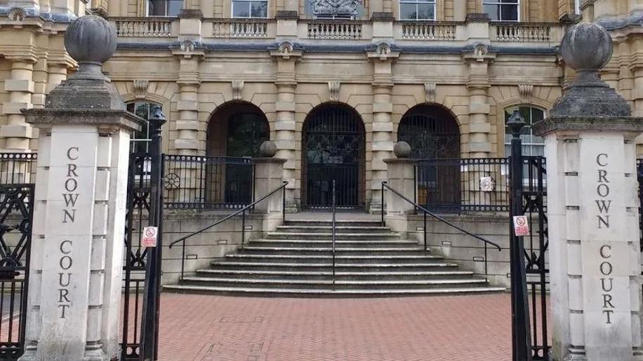 A screenshot from Google Maps of the outside of Reading Crown Court. It's a grand-looking stone building with steps leading up to the front door with pillars on both sides of the entrance.