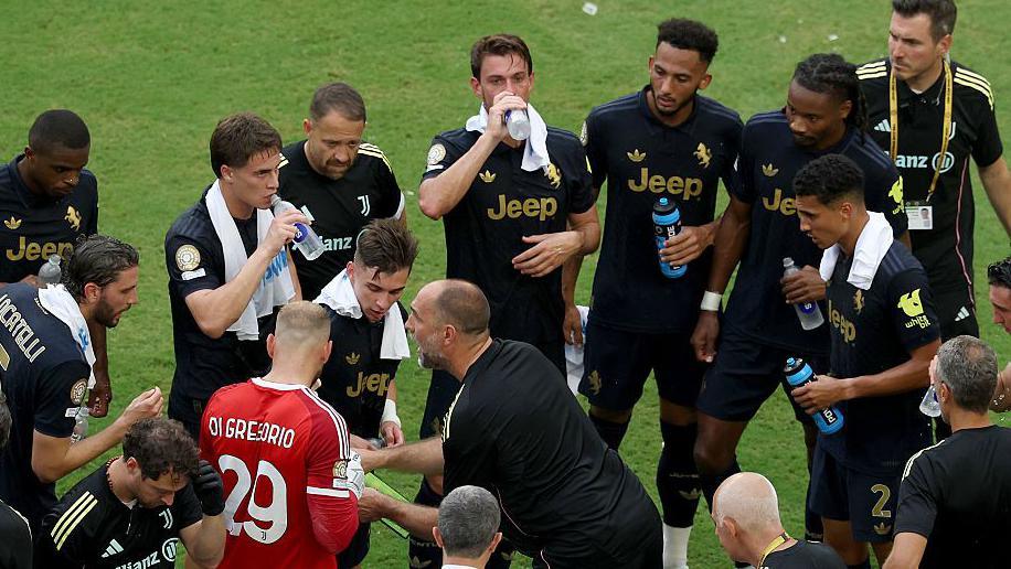 Juventus coach Igor Tudor speaking to his players during a cooling break at the Club World Cup