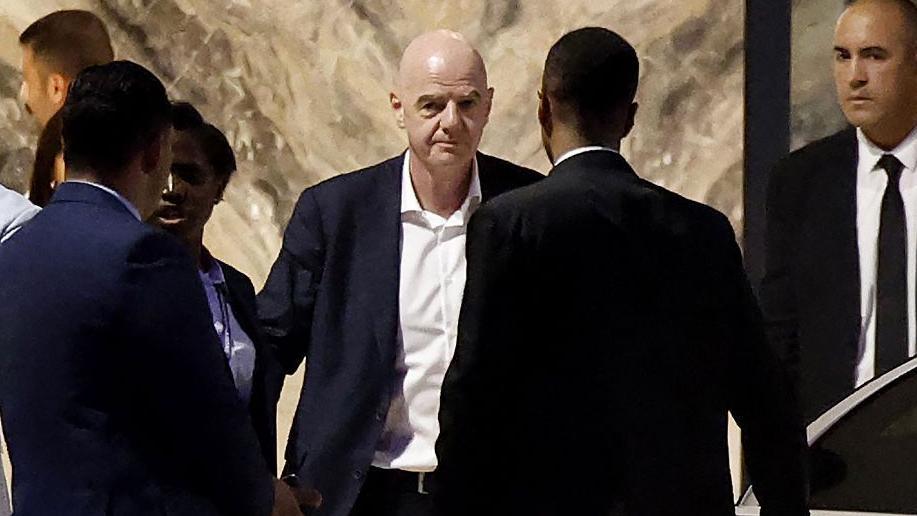 FIFA President Gianni Infantino (C) leaves Al-Madina Stadium in Rabat following the 2026 Women's Africa Cup of Nations.