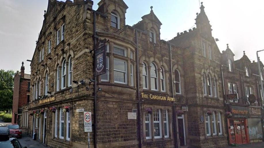 The Cardigan Arms pub situated on the corner of a road side. 