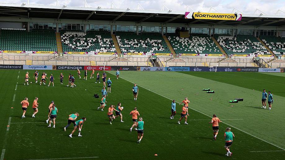 England players warming up at Franklin's Gardens on Friday for training