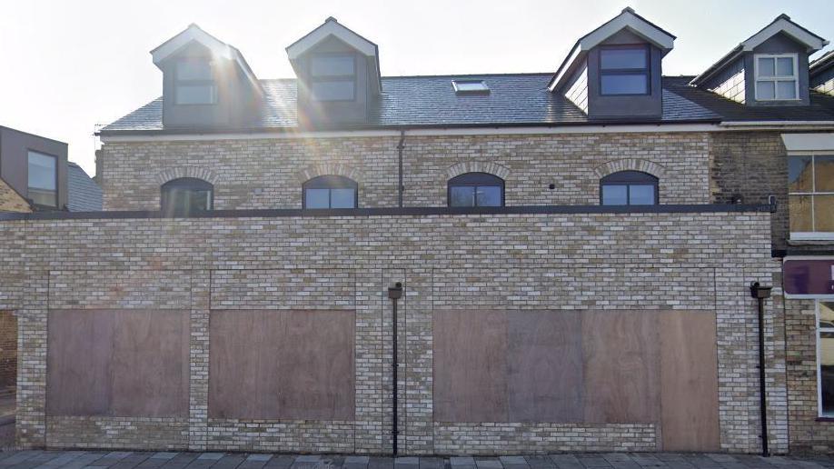 Building with boarded windows