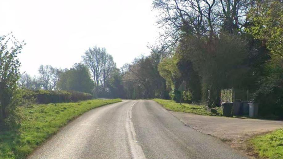A google maps streetview image of the country road near the farm.