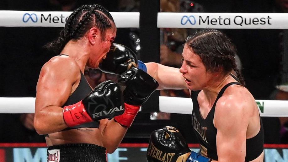 Amanda Serrano is punched in the face by Katie Taylor