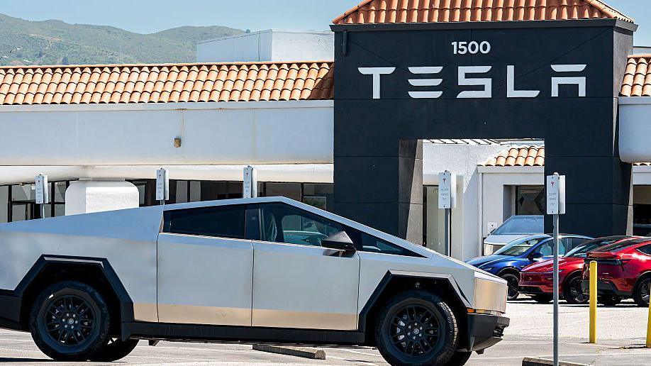 A cyber truck outside a Tesla plant