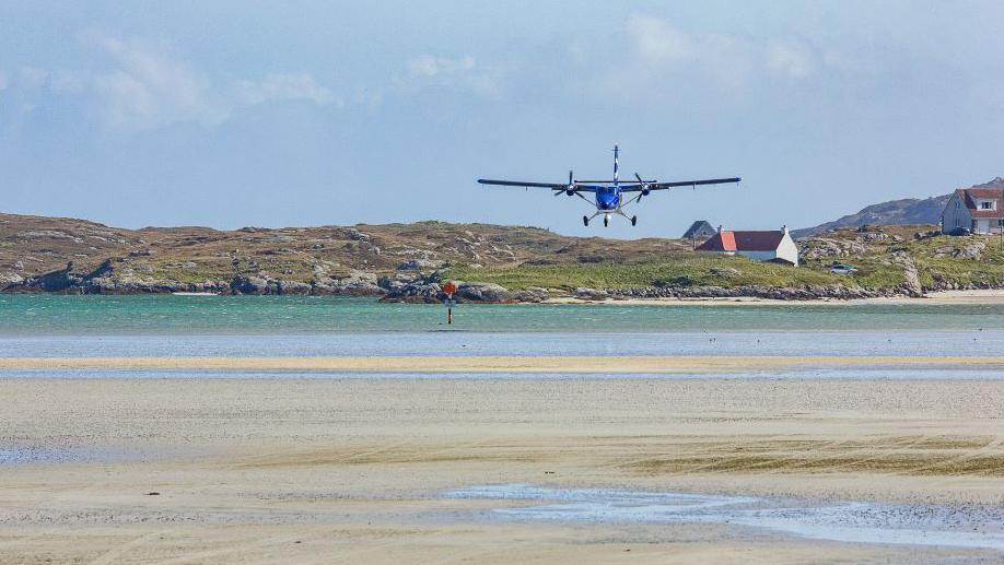 Plane landing at Barra