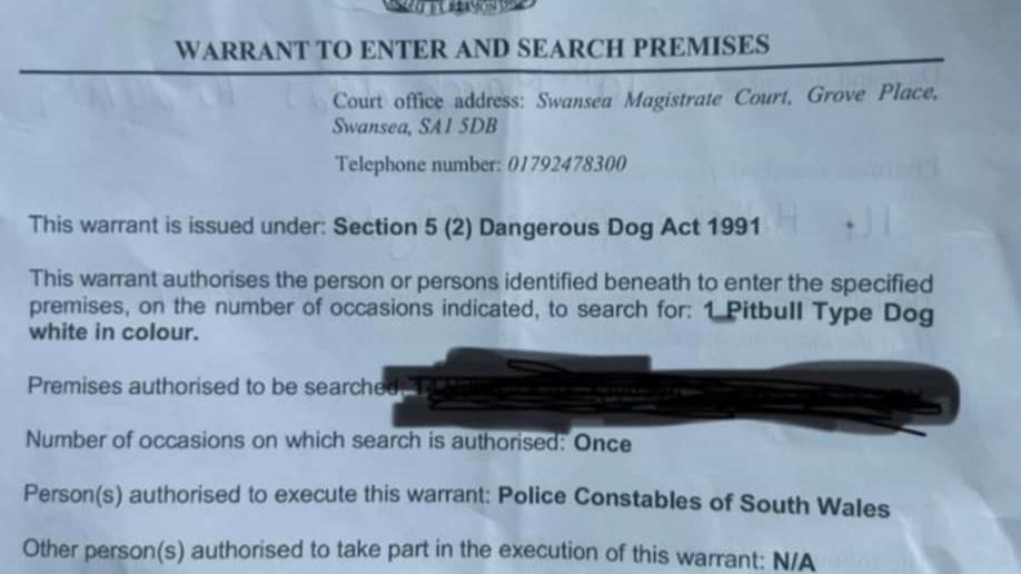 A warrant provided by South Wales Police which allowed them to seize Ralph due to his similarities to an XL Bully. The information relates the police force and reasons for seizure. The address of the owners has been blacked out with a pen.