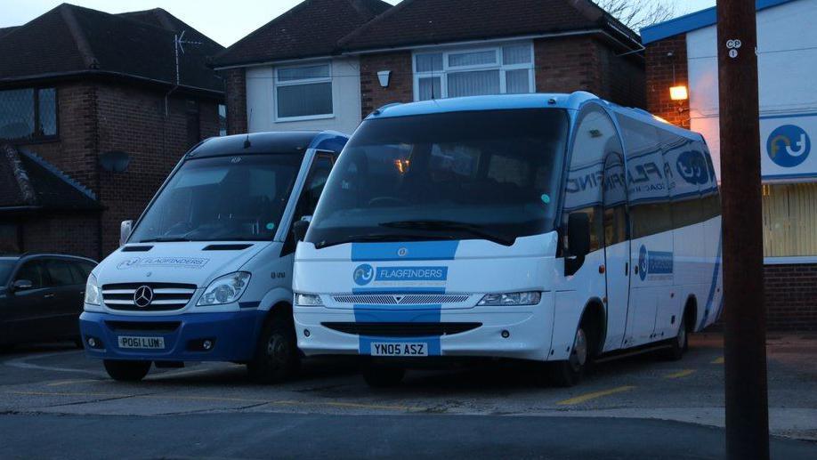 Flagfinders vehicles parked outside a depot in Braintree, Essex