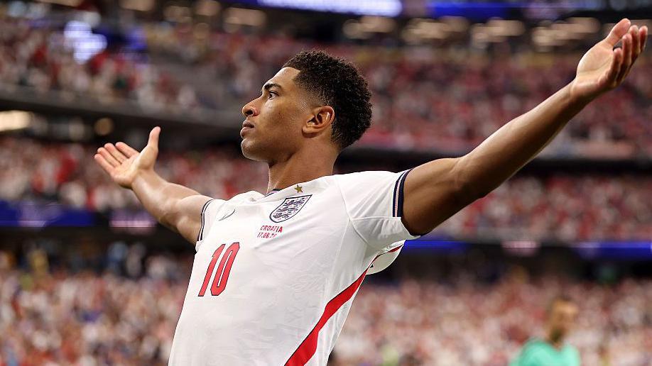 Jude Bellingham celebrates scoring for England at the World Cup
