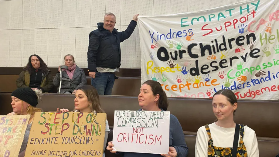 Parents and campaigners at a meeting