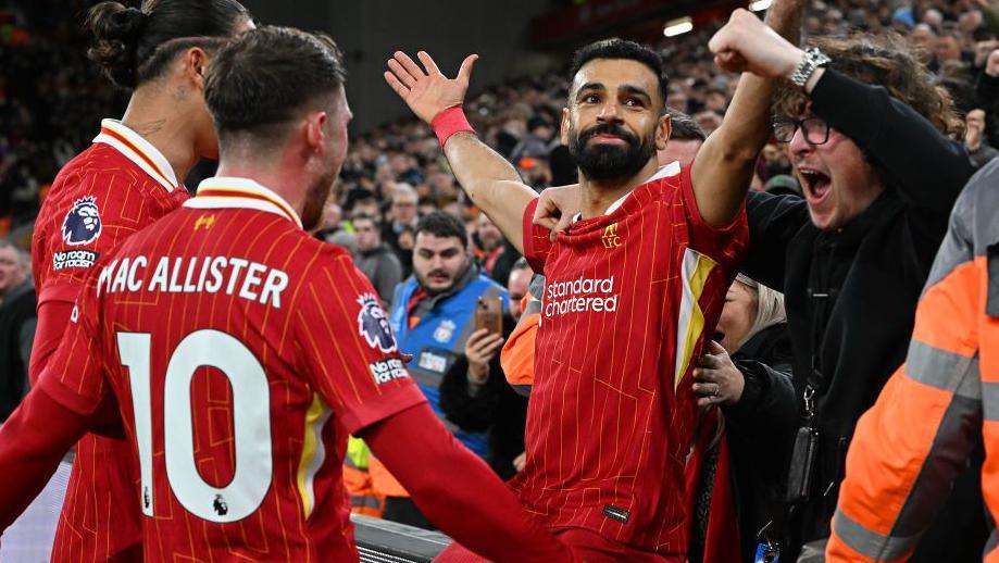 Mohamed Salah celebrated with Liverpool's fans after scoring the second goal in the win over Manchester City at Anfield