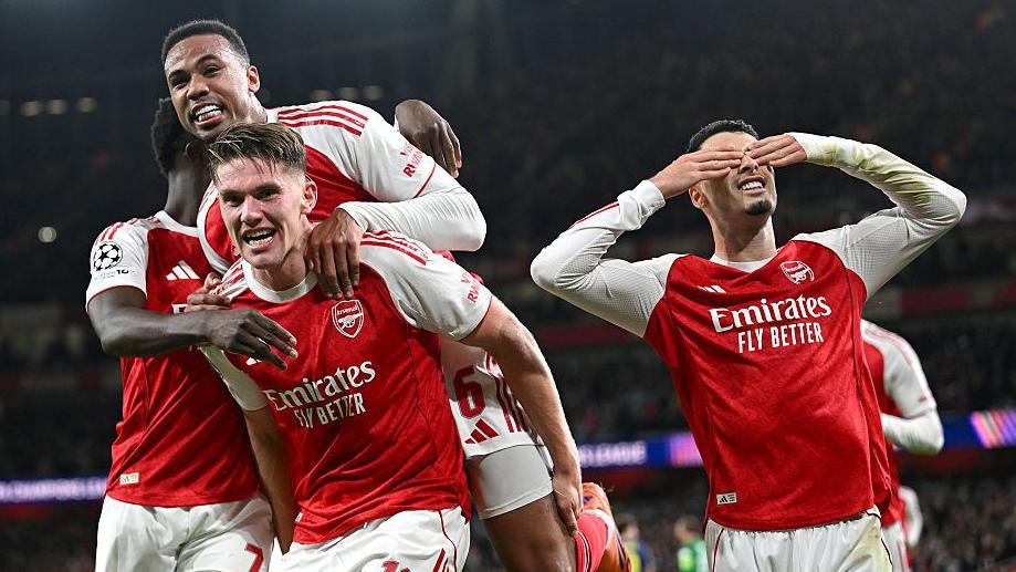Viktor Gyokeres celebrates scoring against Atletico Madrid with his Arsenal team-mates