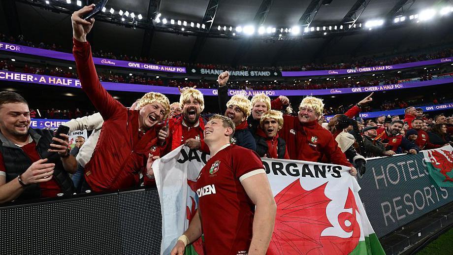 Jac Morgan of the British & Irish Lions celebrates victory with supporters following the second test of the series between Australia Wallabies and British & Irish Lions at the Melbourne Cricket Ground on July 26, 2025 in Melbourne, Australia.