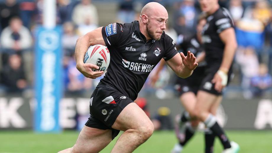 Lee Kershaw running with ball in hand for London Broncos 