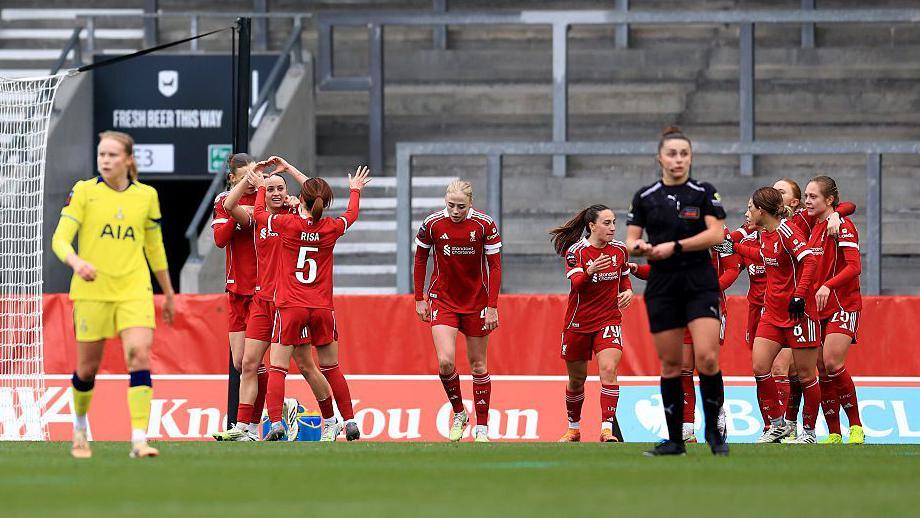 Mia Enderby of Liverpool celebrating goal with teammates during the Barclays Women's Super League match between Liverpool and Tottenham Hotspur.