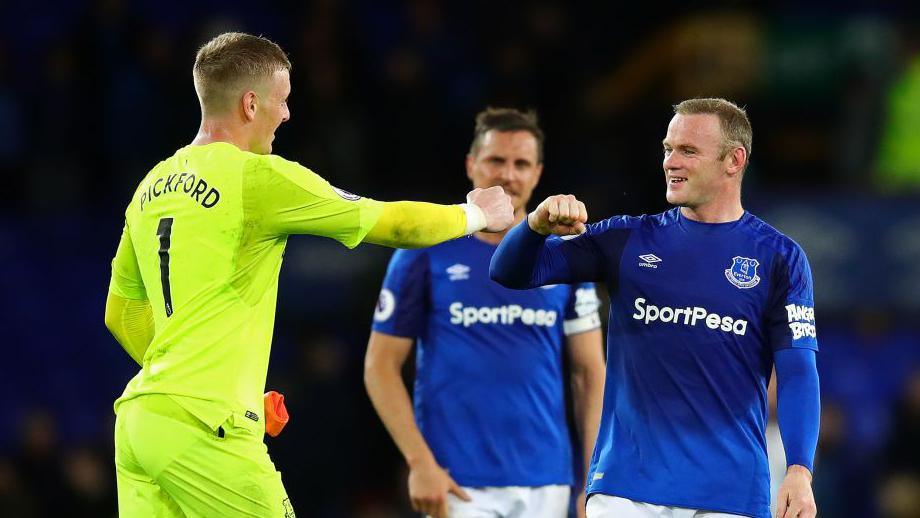 Jordan Pickford and Wayne Rooney