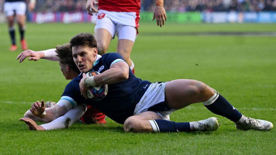 Tom Jordan scoring against Wales