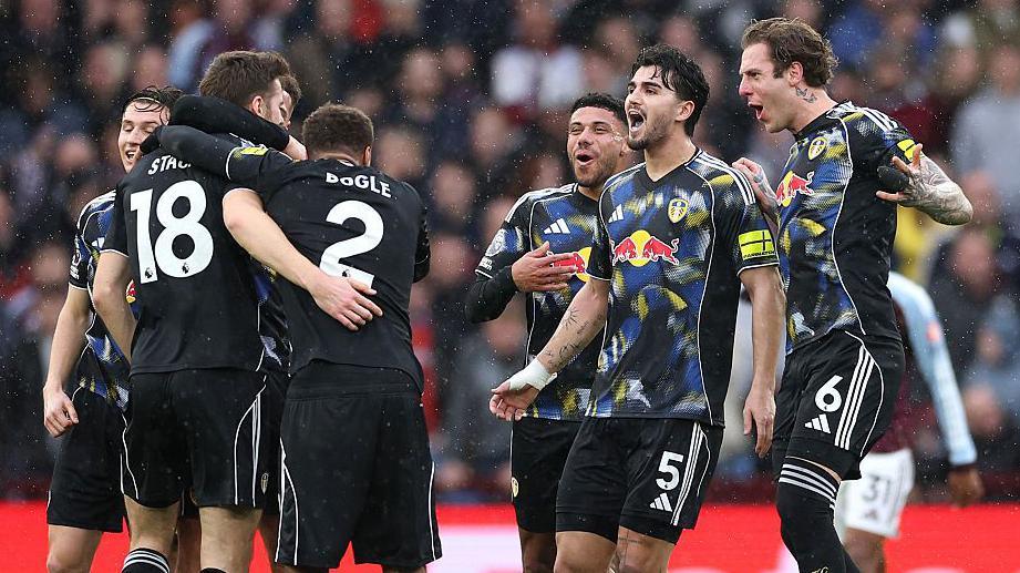 Leeds players celebrate a goal