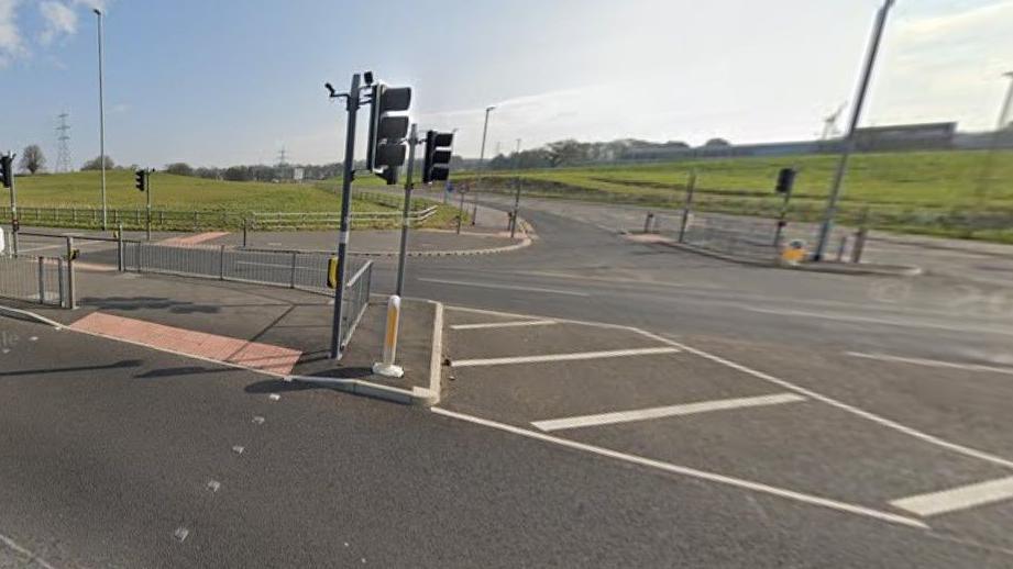 Junction of A6 and Sir John Fisher Drive, Lancaster with traffic lights and a pedestrian crossing