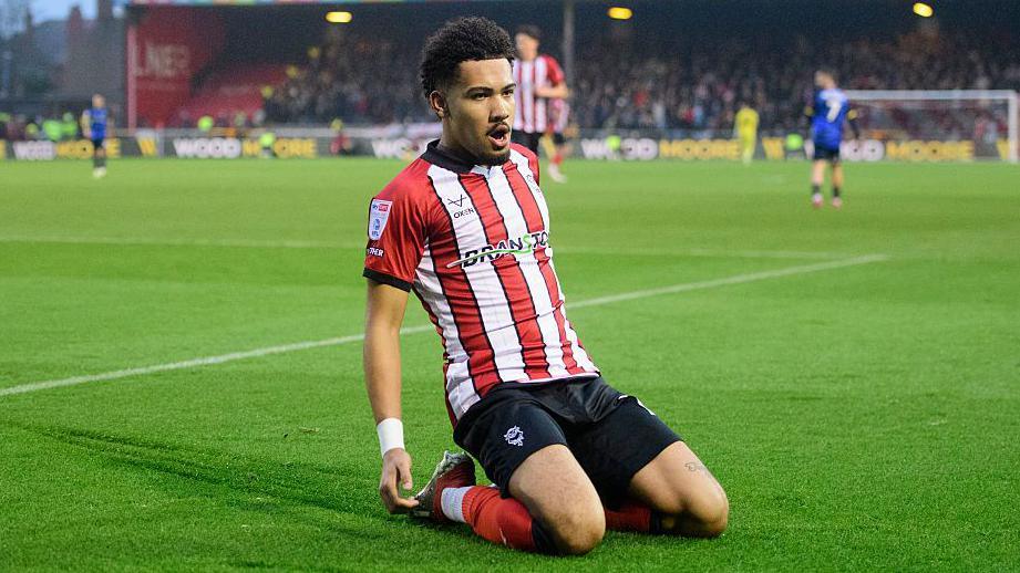 Frankie Okoronkwo celebrates his opening goal against Doncaster