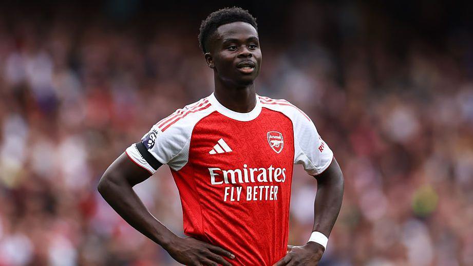 Arsenal's Bukayo Saka with his hands on his hips