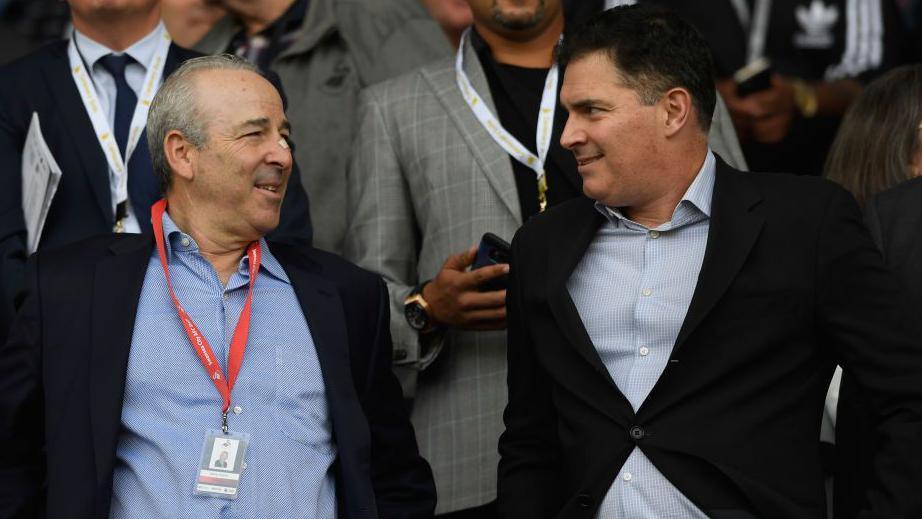 Steve Kaplan and Jason Levien at a Swansea game in 2017