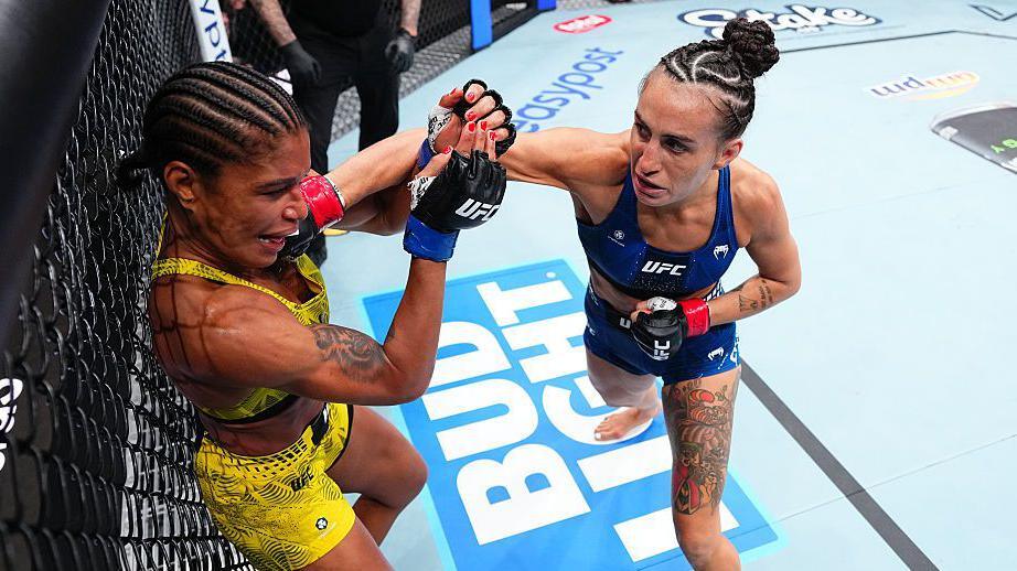 Gabriella Fernandes is punched by Casey O'Neill