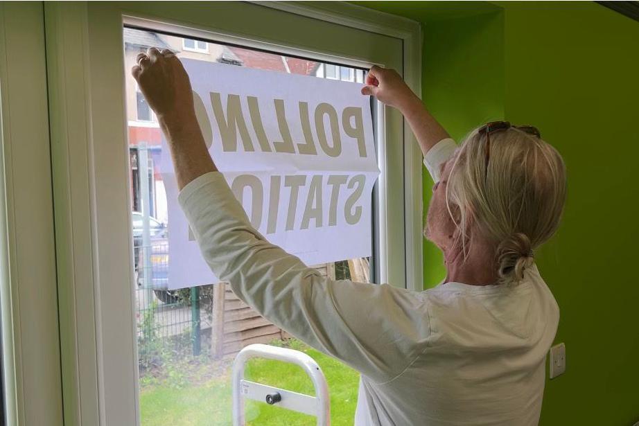 Andy setting up a polling station