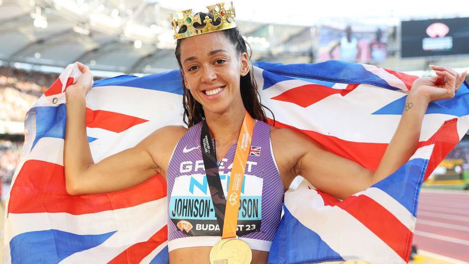 Katarina Johnson-Thompson celebrates after winning world gold 