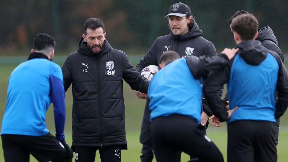 West Brom head coach Carlos Corberan takes a training session