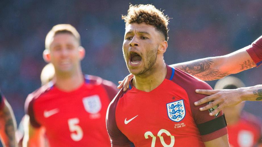 Alex Oxlade-Chamberlain celebrates scoring for England at Hampden in 2017