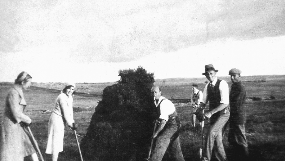 People building an earthwork tump on Mendip 