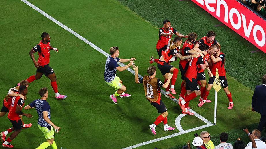 Sasa Kalajdzic celebrates his equaliser with his teammates