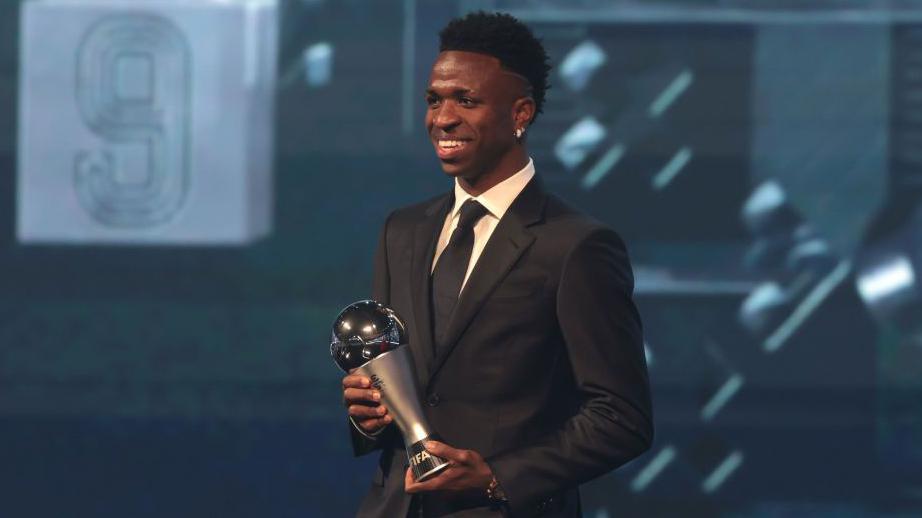 Vinicius Jr holds the Fifa Best men's player of the year trophy