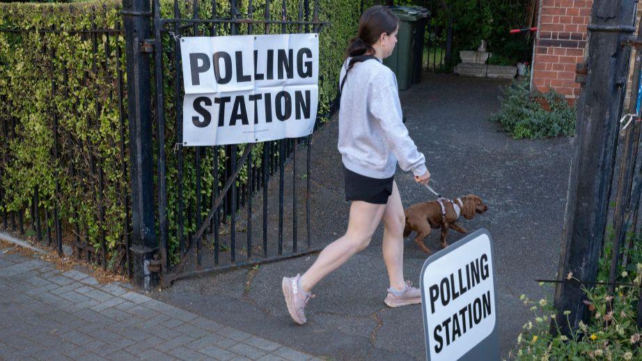 Woman at polling station