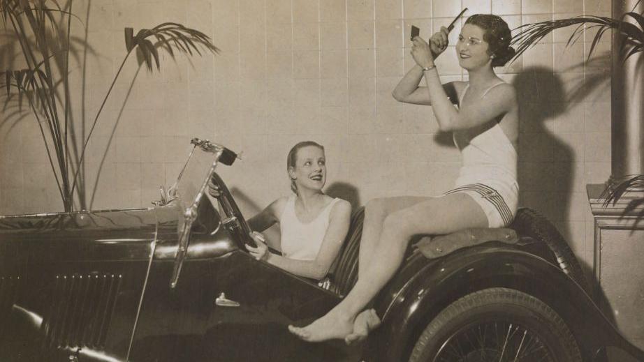 1934
Mannequins display to help sell cars at Whiteleys Motor Show, 1934. Bathing beauties help to sell this sporting car. Photograph by James Jarche. (Photo by Daily Herald Archive/National Science & Media Museum/SSPL via Getty Images)