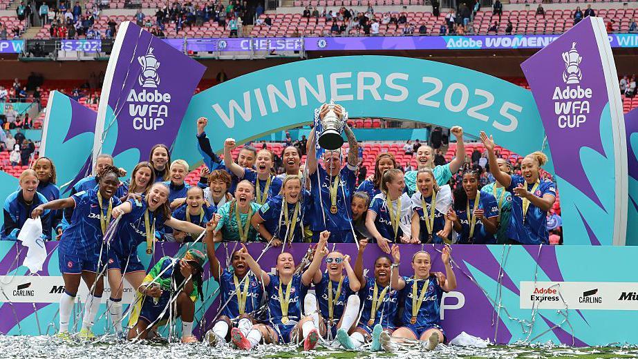 Chelsea celebrate winning the Adobe Women's FA Cup Final against Manchester United at Wembley Stadium in London, England, on May 18, 2025.
