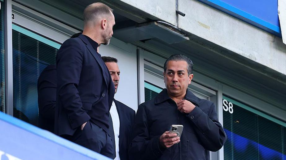 Behdad Eghbali speaks to sporting directors Paul Winstanley and Laurence Stewart