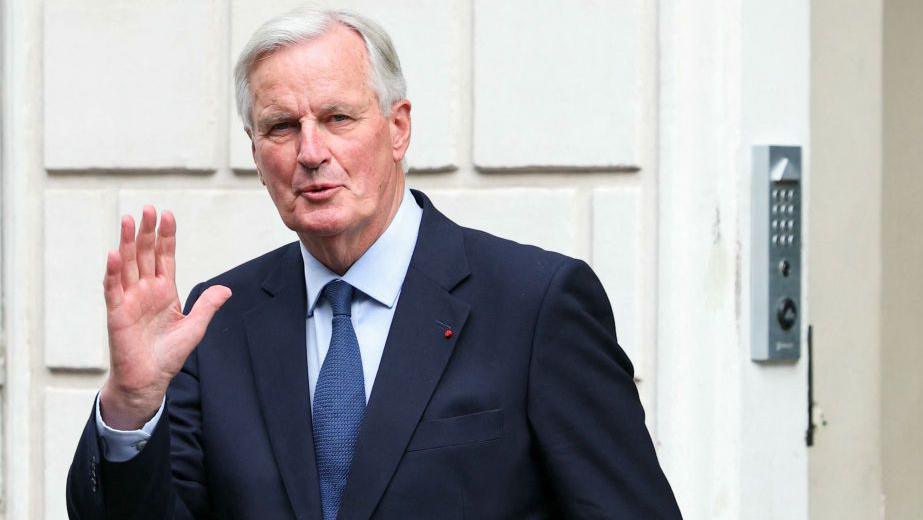 Newly appointed Prime minister Michel Barnier gestures before the handover ceremony at the Hotel Matignon in Paris, on 5 September 2024