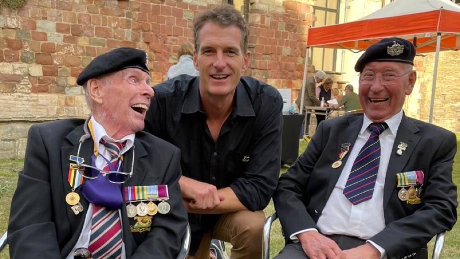 Historian Dan Snow in the centre of the picture between Korean War veterans Brian Hamblett on the right and Tommy Clough on the left