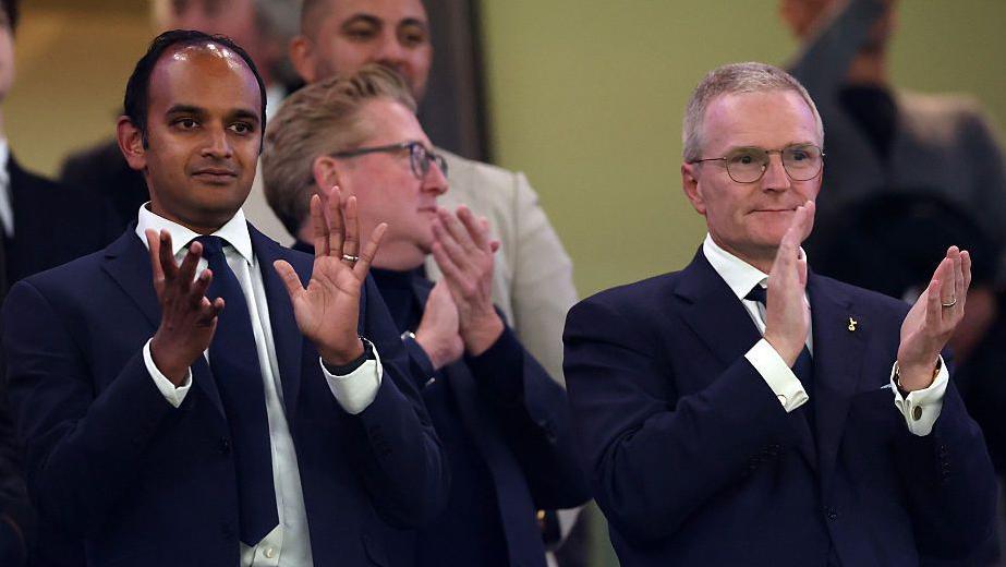 Tottenham's chief executive Vinai Venkatesham and non-executive chairman Peter Charrington applaud during a Champions League game with Villarreal in September 2025