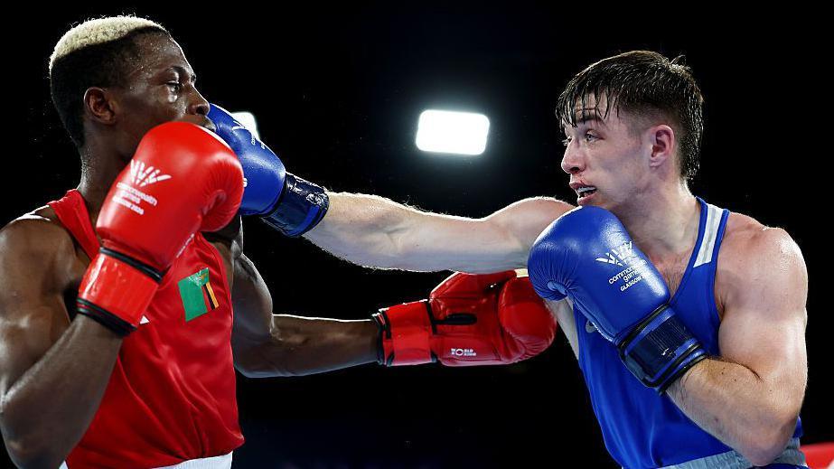 Jude Gallagher lands a right hand on Albert Ngulube