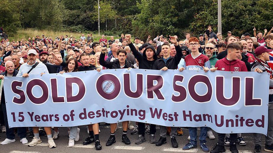 West Ham fans protest against the owners of the club outside the London Stadium