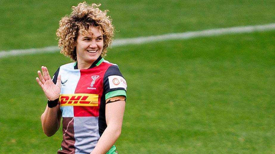 Ellie Kildunne waves while playing for Harlequins