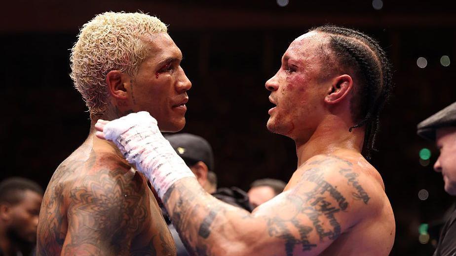 Conor Benn and Regis Prograis hug