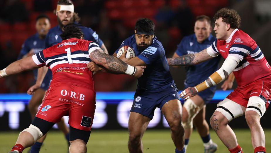 Reikati Ma'asi-White breaks a tackle for Sale Sharks