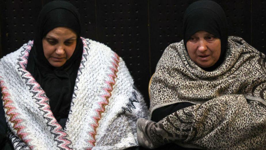 Palestinian families react after Israel delayed the release of Palestinian prisoners, scheduled to be released in the seventh hostage-prisoner exchange, in the occupied West Bank city of Ramallah early on February 23, 2025