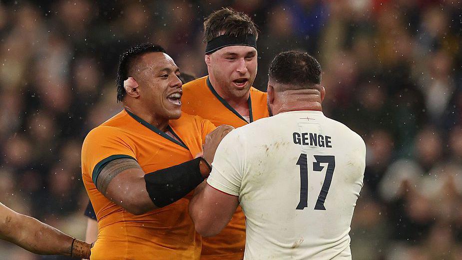 Ellis Genge tussles with Australia players at Twickenham