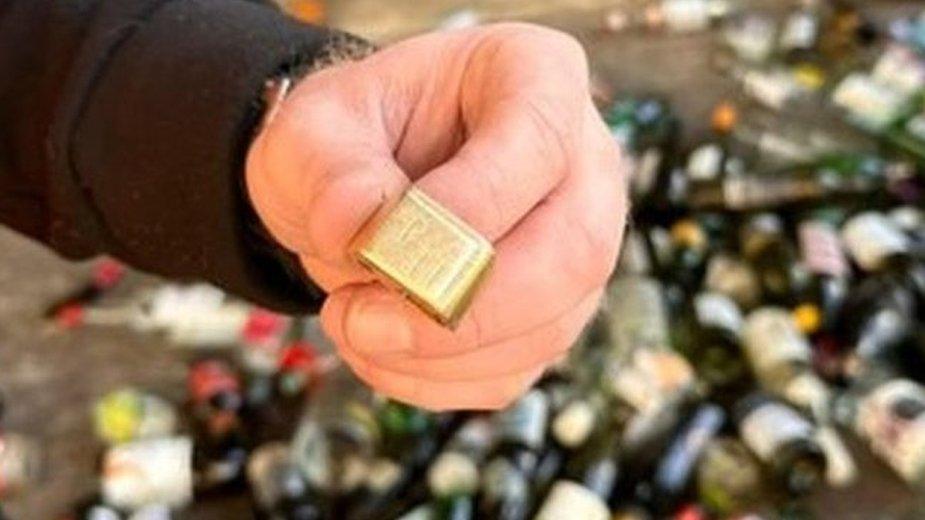 Bottle bank gold ring