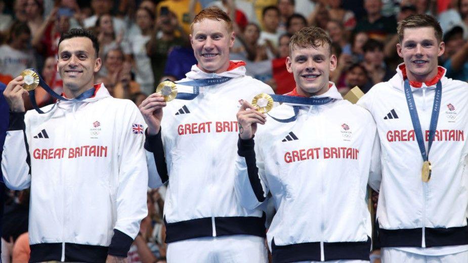 GB's 4x200m relay team show off their gold medals